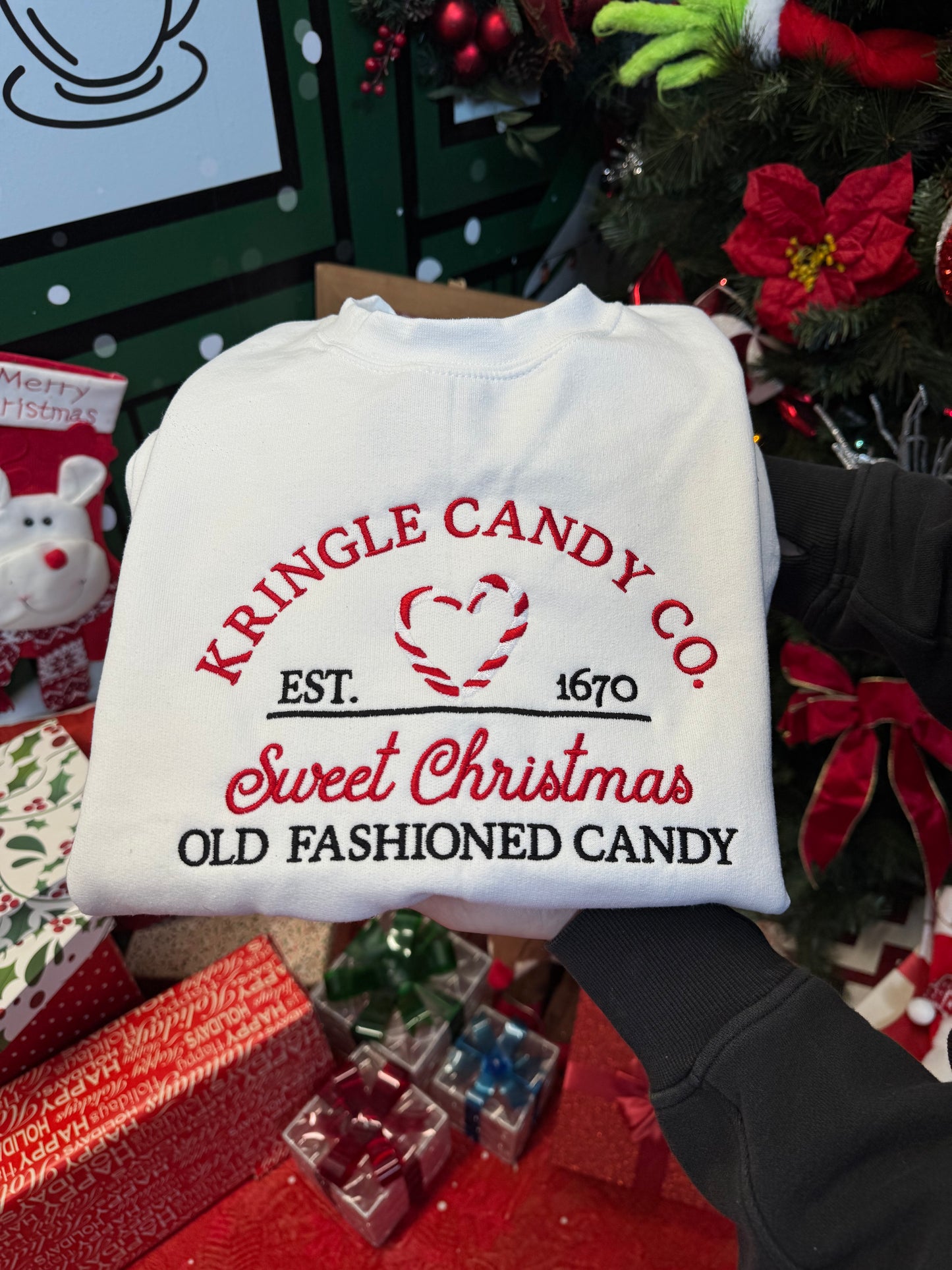 Shop Embroidered Kringle Candy Co. Christmas Crewneck online at Willow Boutique – best boutique for women’s fashion.