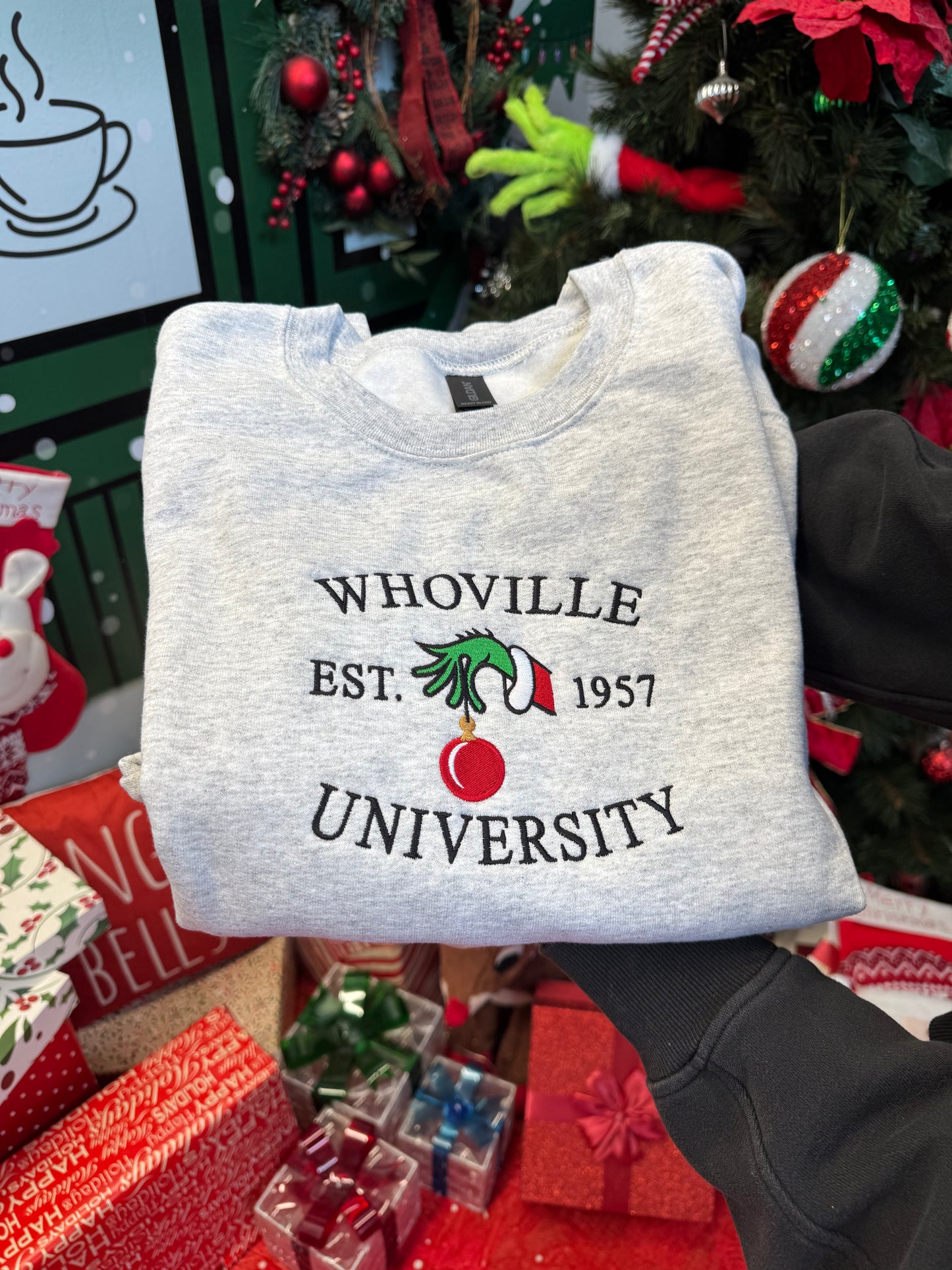 Shop Embroidered Whoville University Est. 1957 Christmas Crewneck online at Willow Boutique – best boutique for women’s fashion.