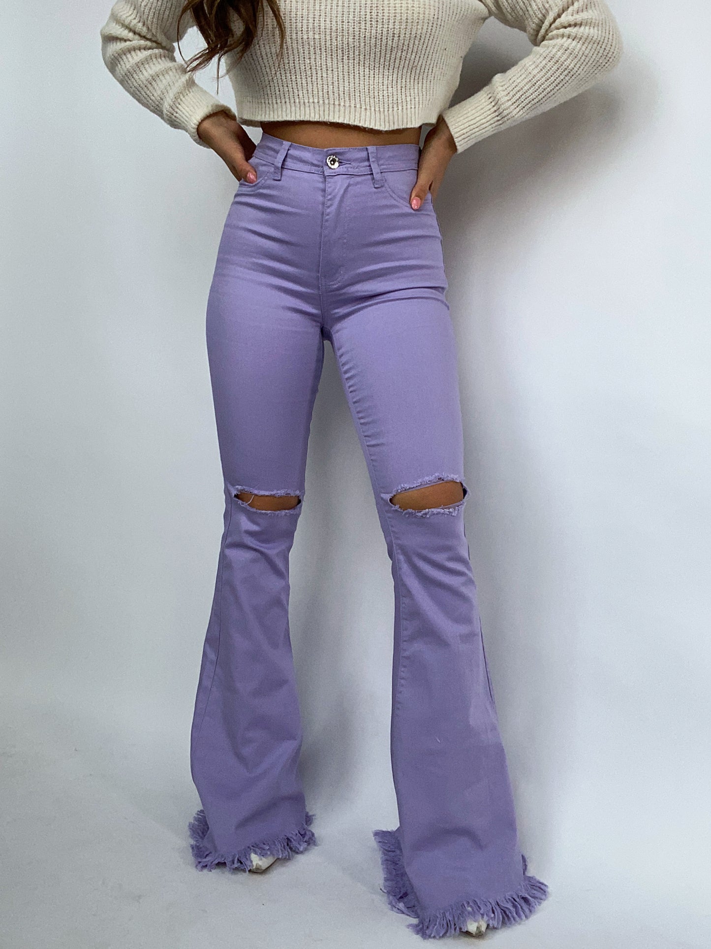 Buy our "Farrah Distressed High Waisted Flares - Lavender" online – Willow Boutique Clothing. Shop stylish Farrah Distressed High Waisted Flares - Lavender today.