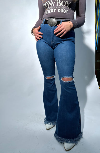 Buy our "Farrah Denim Distressed High Waisted Flares - Medium Wash" online – Willow Boutique Clothing. Shop stylish Farrah Denim Distressed High Waisted Flares - Medium Wash today.
