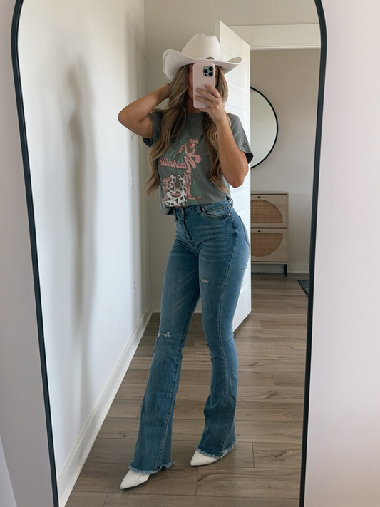 Buy our "Sarah Distressed Medium Wash Flares" online – Willow Boutique Clothing. Shop stylish Sarah Distressed Medium Wash Flares today.
