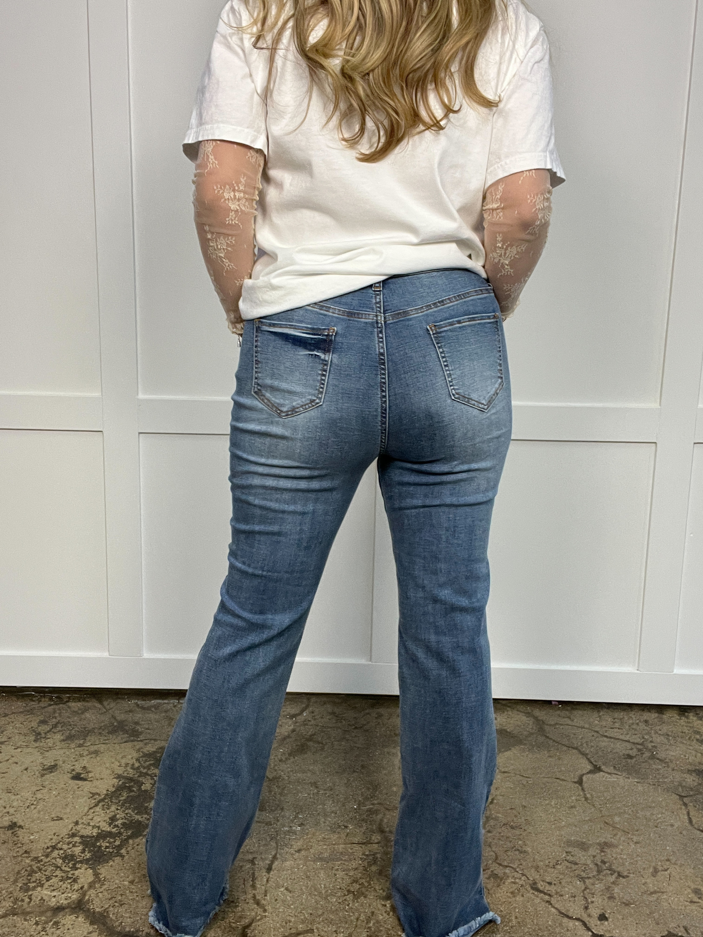 Buy our "Sarah Distressed Medium Wash Flares" online – Willow Boutique Clothing. Shop stylish Sarah Distressed Medium Wash Flares today.