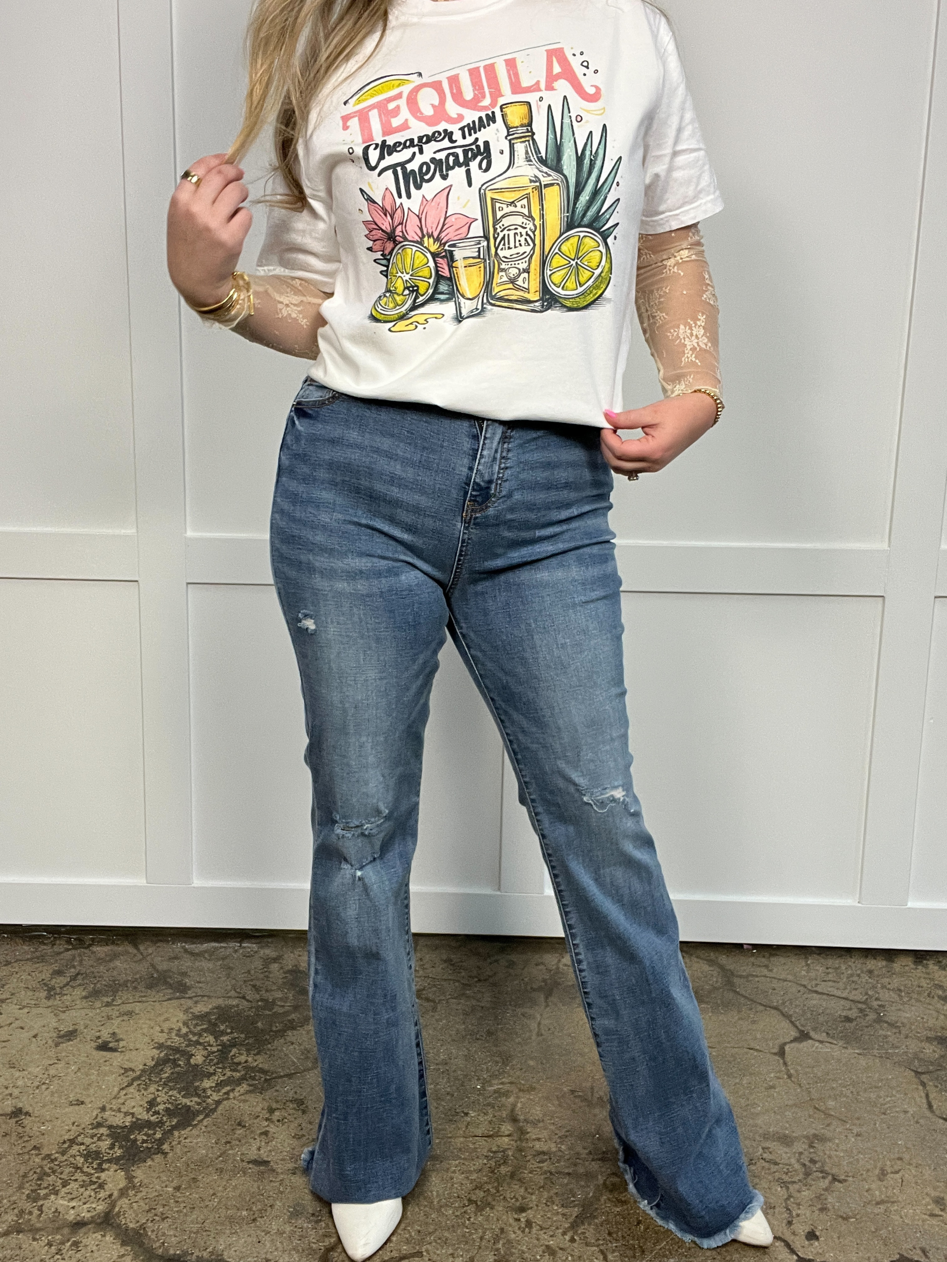 Buy our "Sarah Distressed Medium Wash Flares" online – Willow Boutique Clothing. Shop stylish Sarah Distressed Medium Wash Flares today.