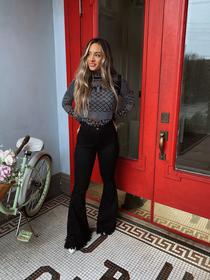 Buy our "Farrah Distressed High Waisted Flares - Black" online – Willow Boutique Clothing. Shop stylish Farrah Distressed High Waisted Flares - Black today.