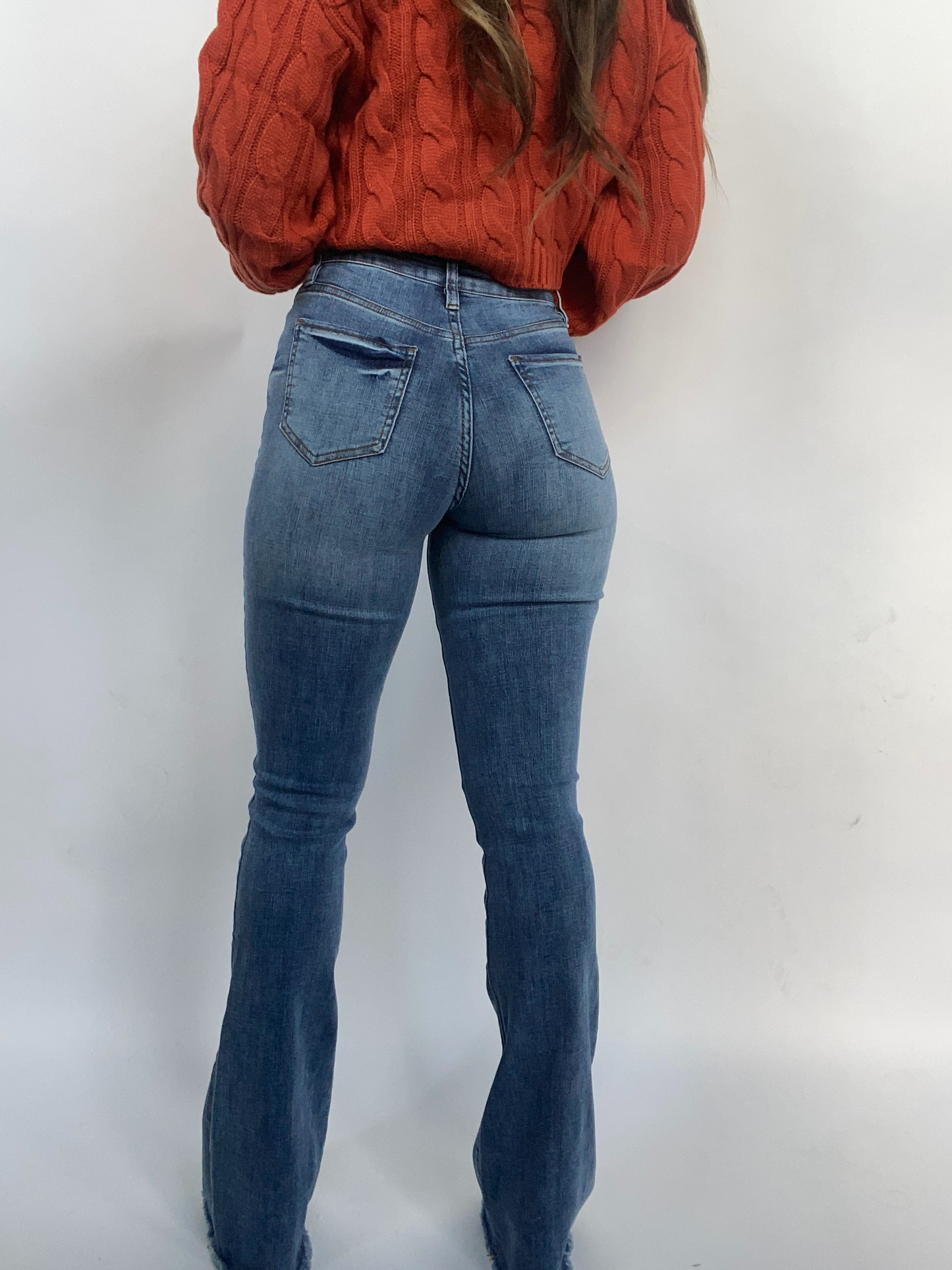 Buy our "Sarah Distressed Medium Wash Flares" online – Willow Boutique Clothing. Shop stylish Sarah Distressed Medium Wash Flares today.