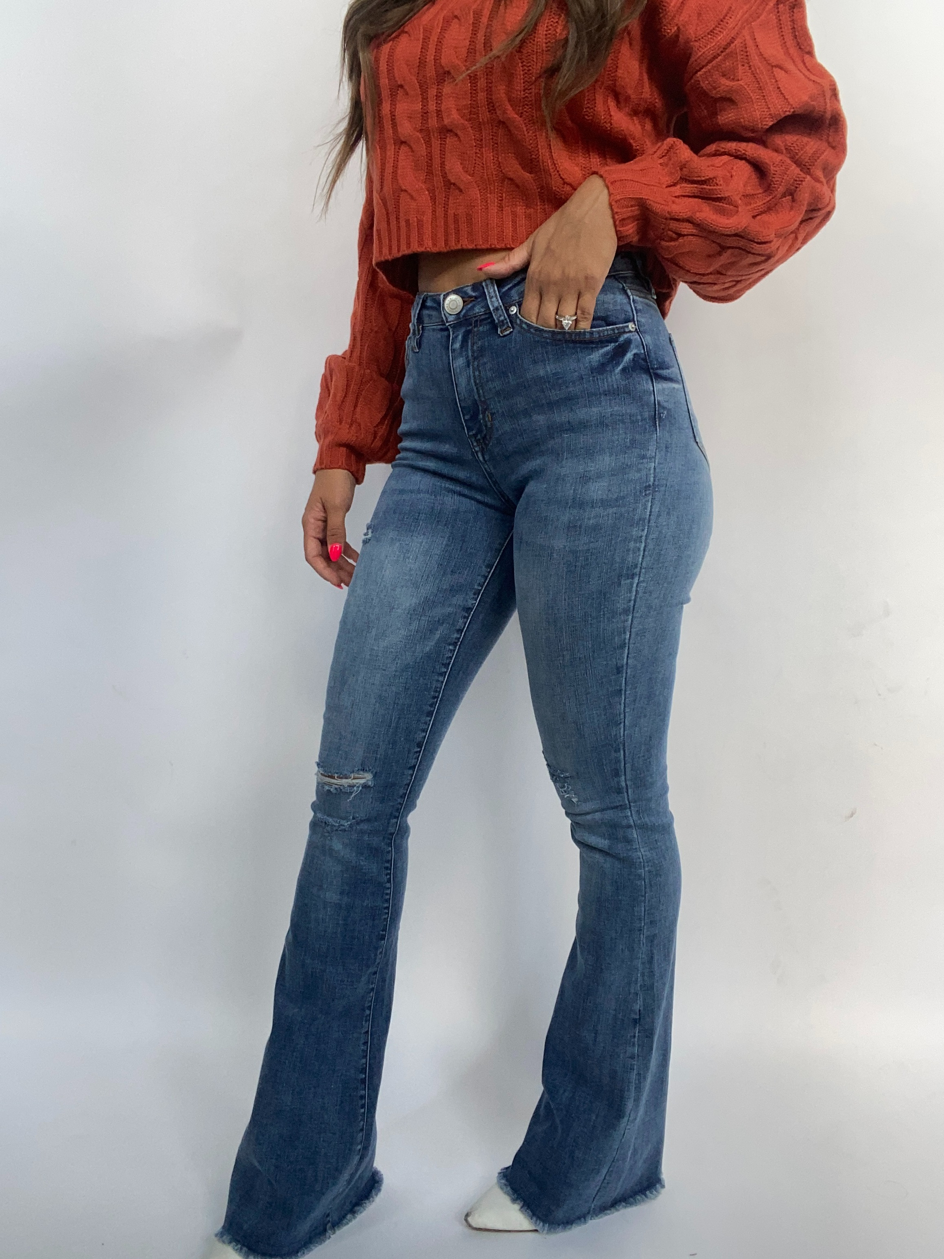 Buy our "Sarah Distressed Medium Wash Flares" online – Willow Boutique Clothing. Shop stylish Sarah Distressed Medium Wash Flares today.