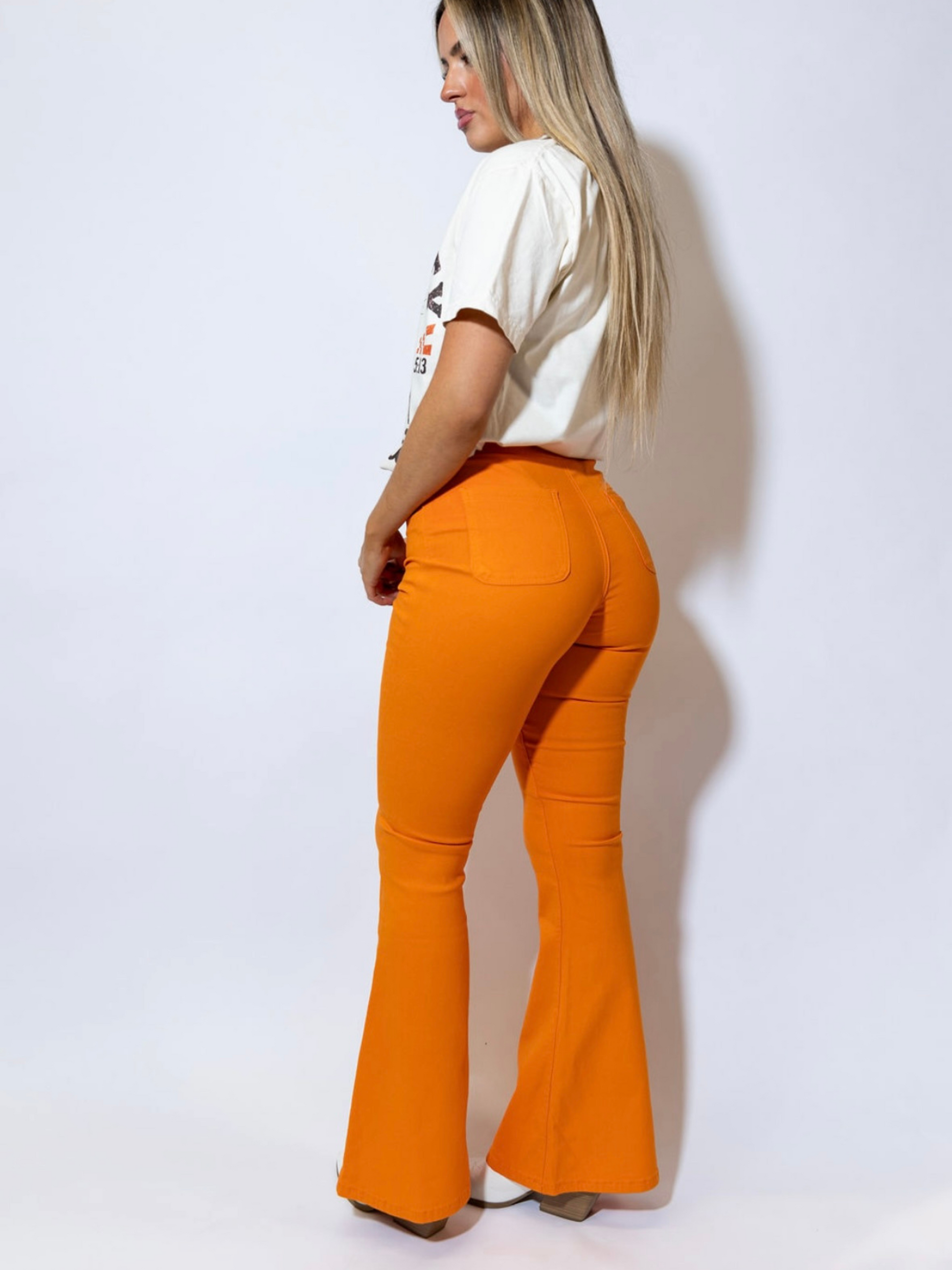 Buy our "Fiona High Waisted Bell Bottom Flare Jeans - Orange" online – Willow Boutique Clothing. Shop stylish Fiona High Waisted Bell Bottom Flare Jeans - Orange today.