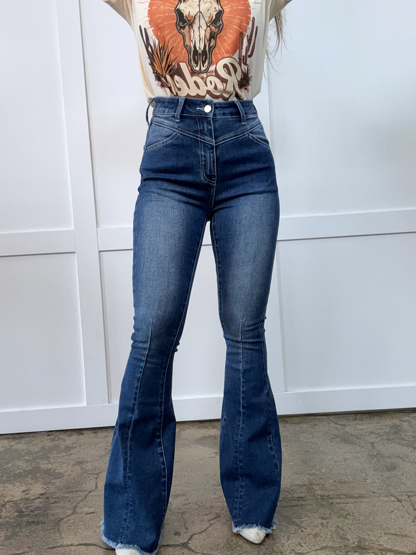 Buy our "Keep Up Flare Acid/Dark Wash Jeans" online – Willow Boutique Clothing. Shop stylish Keep Up Flare Acid/Dark Wash Jeans today.