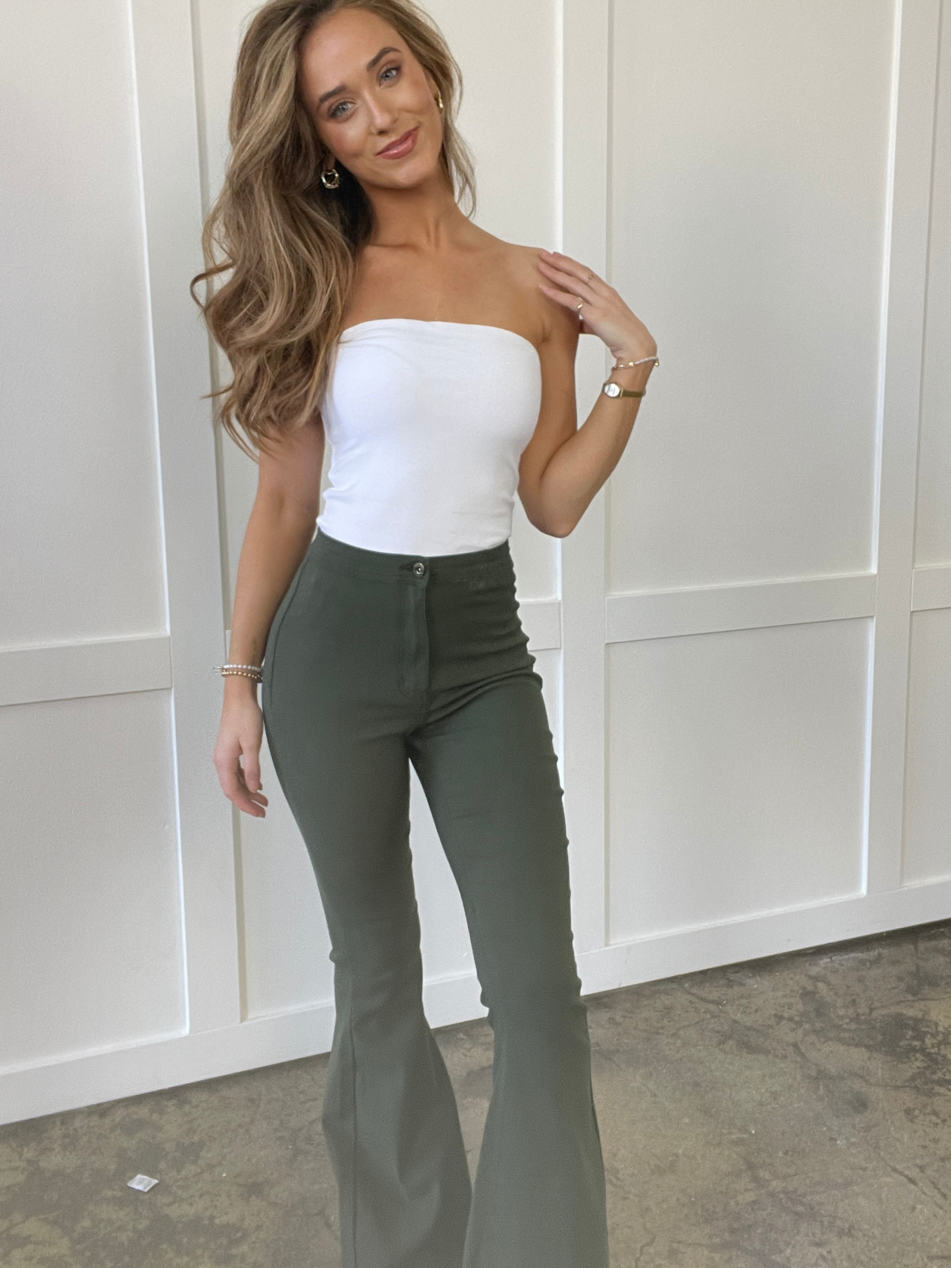 Buy our "Fiona High Waisted Bell Bottom Flare Jeans - Olive" online – Willow Boutique Clothing. Shop stylish Fiona High Waisted Bell Bottom Flare Jeans - Olive today.