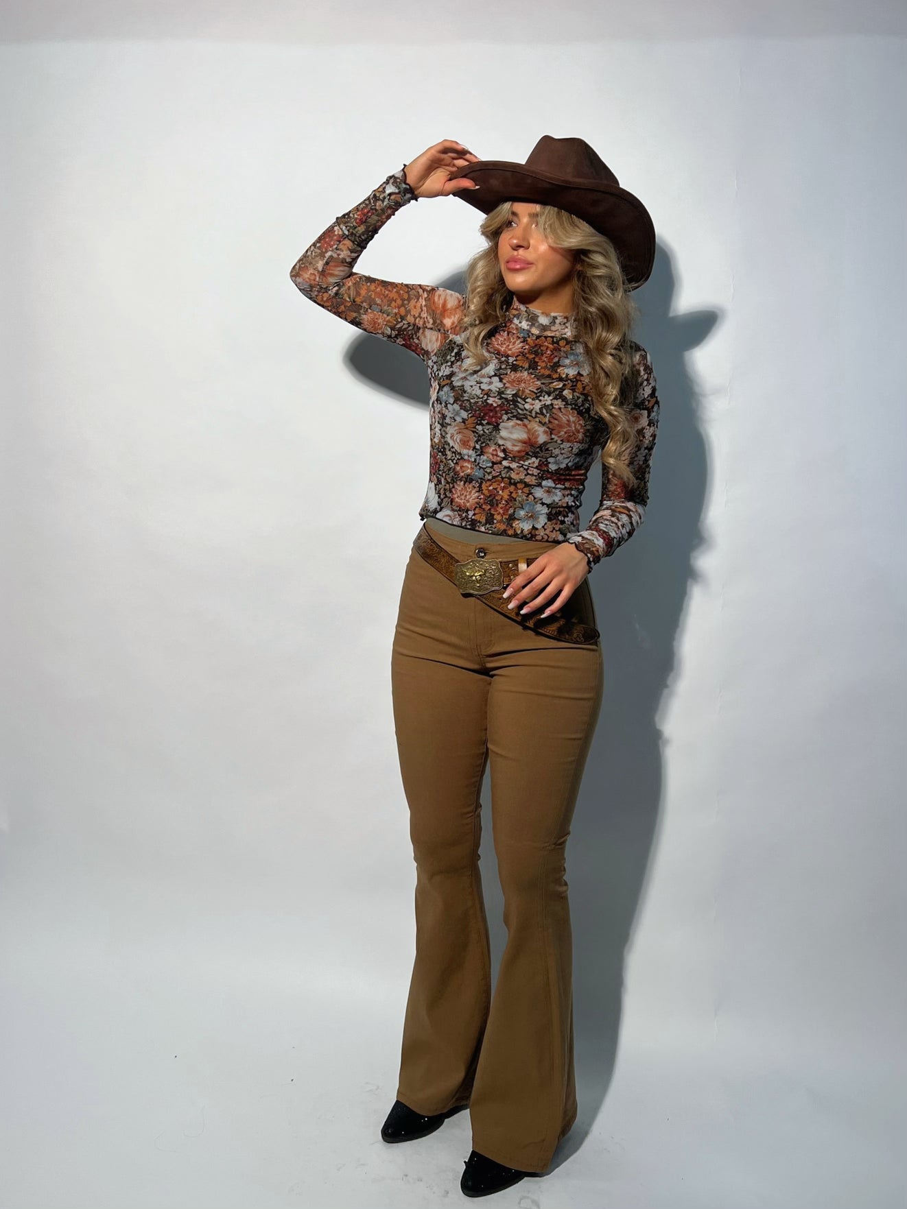 Buy our "Fiona High Waisted Bell Bottom Flare Jeans - Mocha" online – Willow Boutique Clothing. Shop stylish Fiona High Waisted Bell Bottom Flare Jeans - Mocha today.