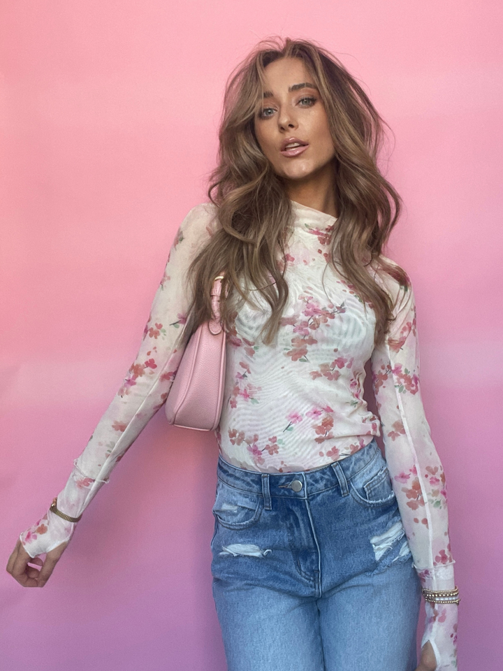 Buy our "Floral Mesh Long Sleeve Top" online – Willow Boutique Clothing. Shop stylish Floral Mesh Long Sleeve Top today.