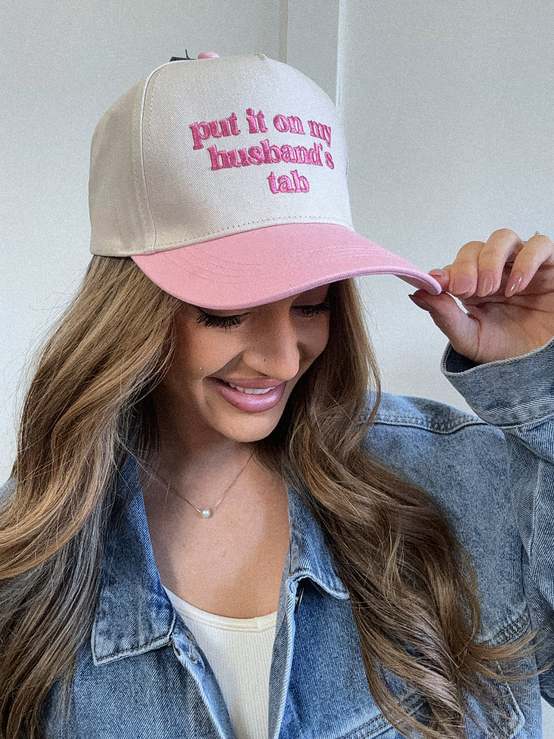 Put It On My Husbands Tab Trucker Hat