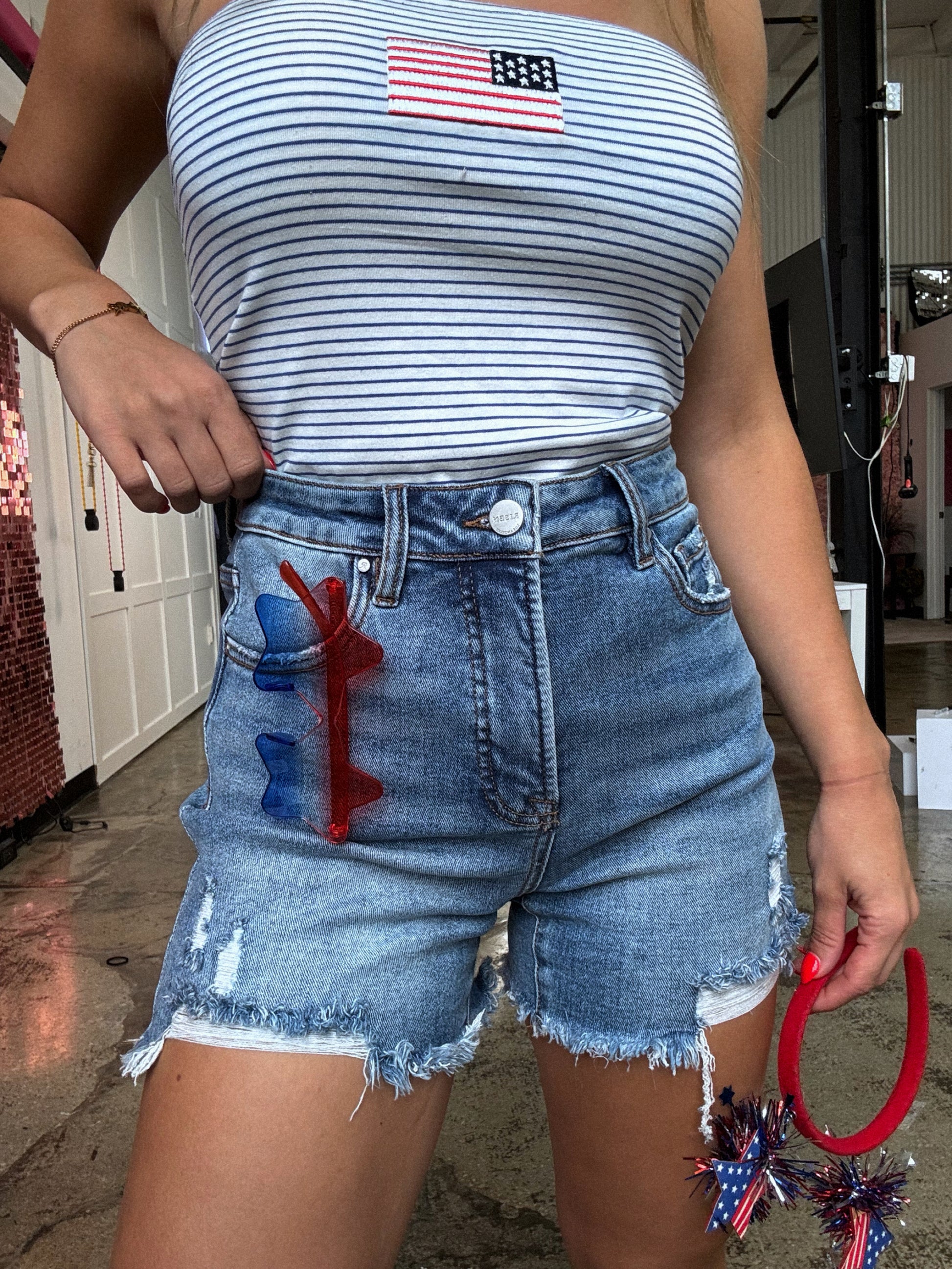 Buy our "All American Shorts Bundle (1 Risen Short + 1 Graphic Tee)" online – Willow Boutique Clothing. Shop stylish All American Shorts Bundle (1 Risen Short + 1 Graphic Tee) today.