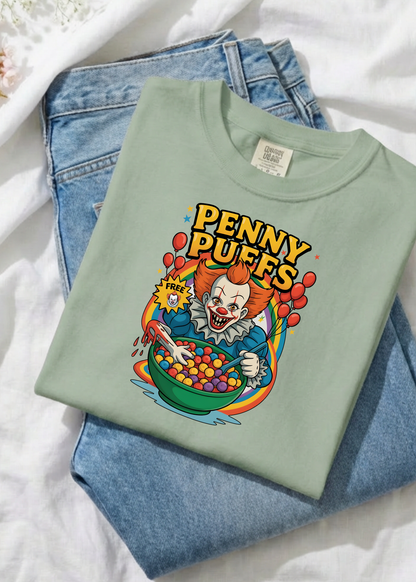 Light green t-shirt with Pennywise graphic design on a white background