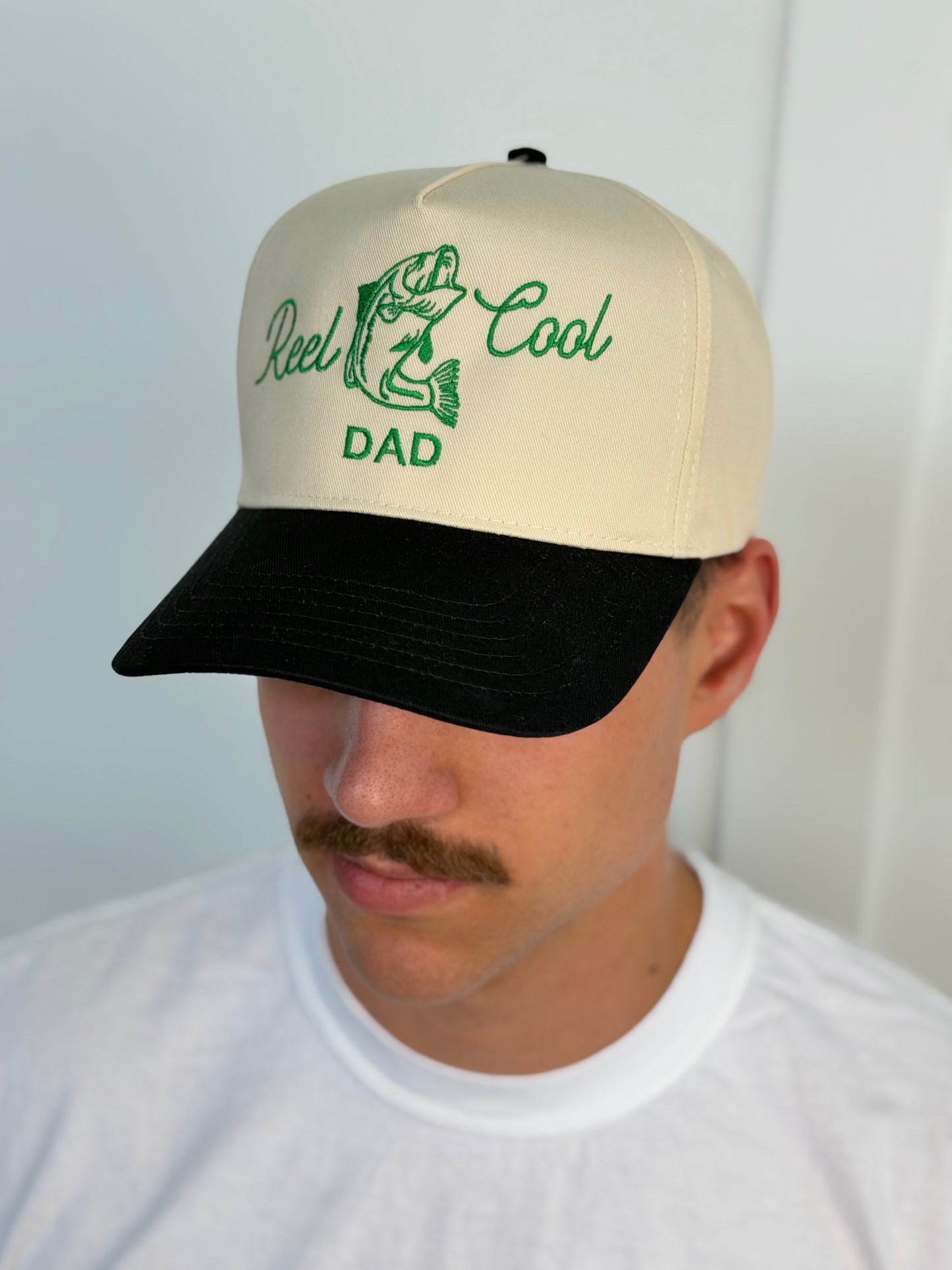 Reel Cool Dad Embroidered Trucker Hat
