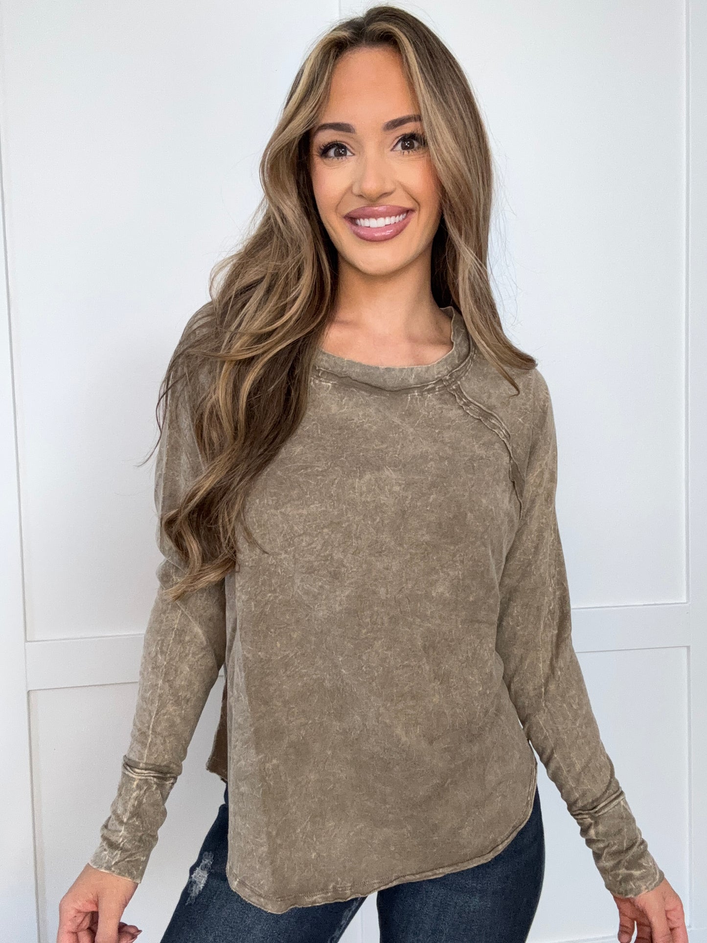Buy our "Carly Crinkle Washed Thumb Hole Cuffs Long Sleeve Top" online – Willow Boutique Clothing. Shop stylish Carly Crinkle Washed Thumb Hole Cuffs Long Sleeve Top today.