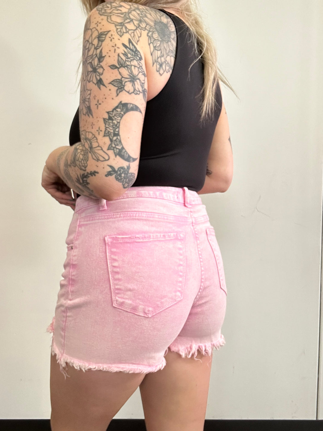 Lindsey Asymmetrical Distressed Shorts- Pink Acid Wash