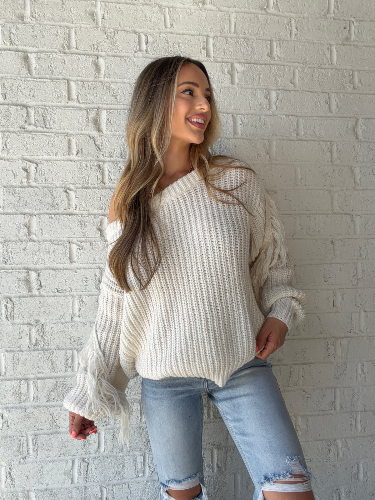 Baylyn Off The Shoulder Fringe Sweater