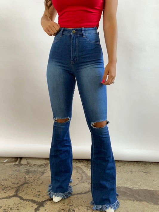 Buy our "Farrah Denim Distressed High Waisted Flares - Medium Wash" online – Willow Boutique Clothing. Shop stylish Farrah Denim Distressed High Waisted Flares - Medium Wash today.