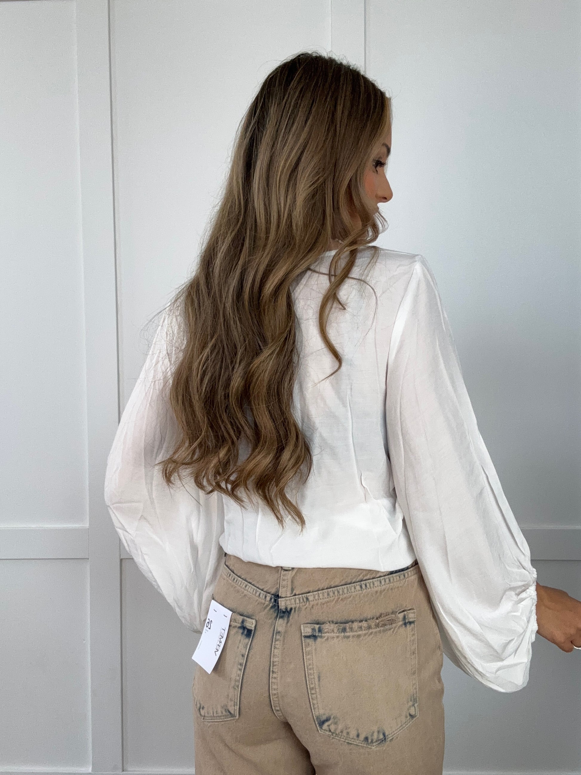 Shop Mustard Seed Front Tie Shirring Long Sleeve Top - White online at Willow Boutique – best boutique for women’s fashion.