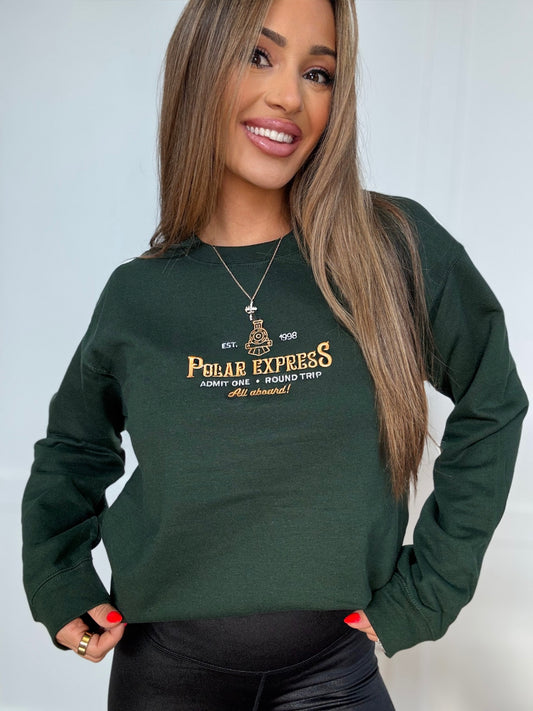 Shop Embroidered Polar Express Christmas Crewneck online at Willow Boutique – best boutique for women’s fashion.