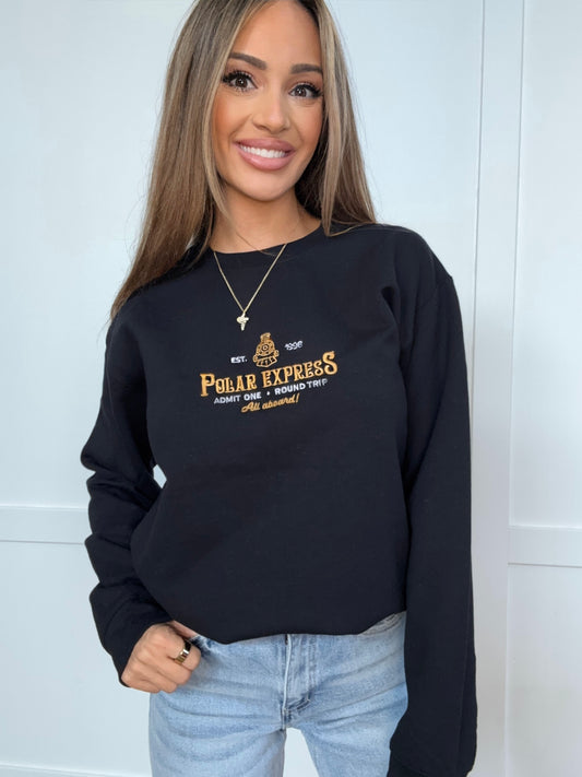 Shop Embroidered Polar Express Christmas Crewneck online at Willow Boutique – best boutique for women’s fashion.