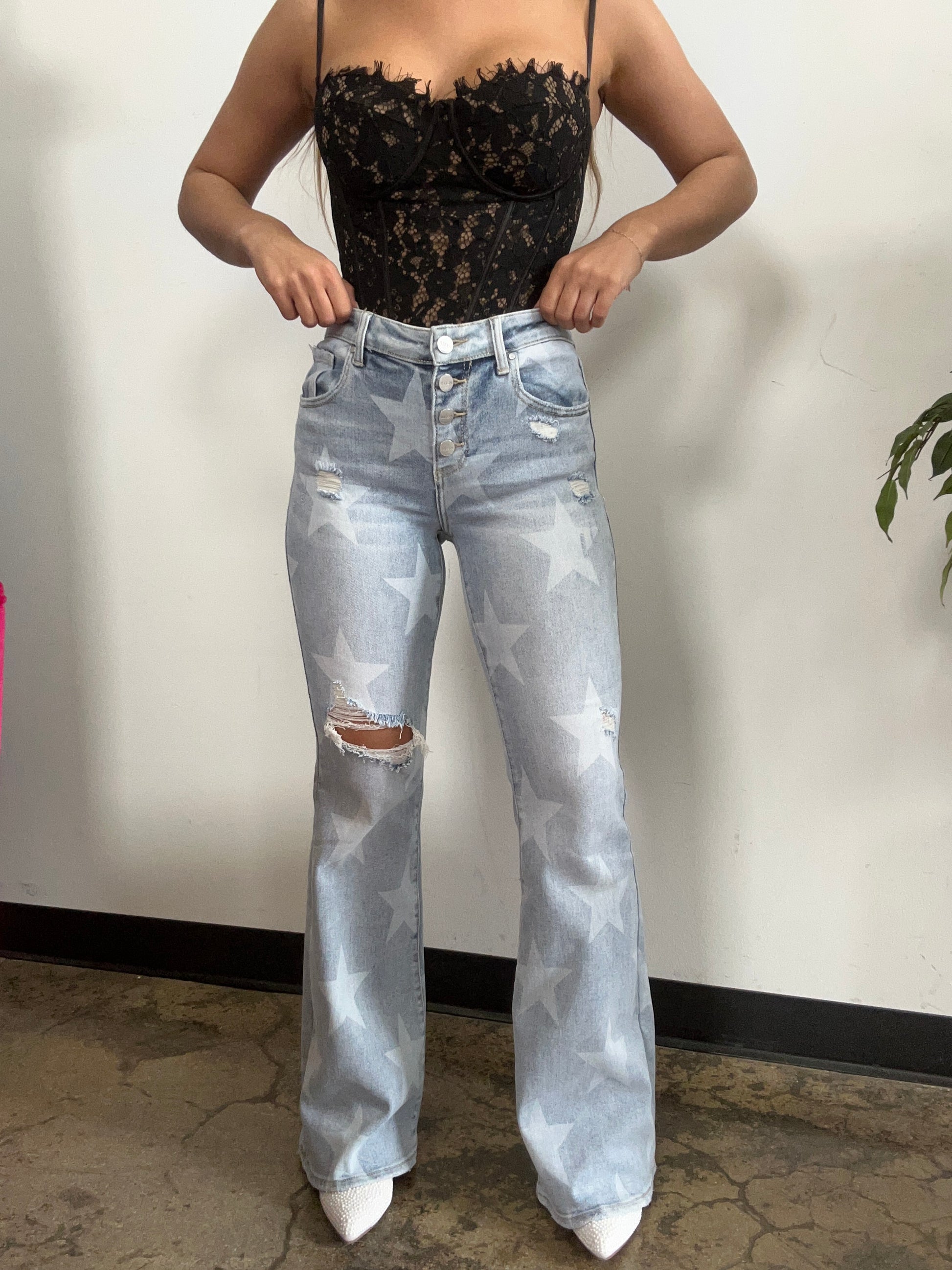 Buy our "Under The Stars Mid-Rise Flare Jeans" online – Willow Boutique Clothing. Shop stylish Under The Stars Mid-Rise Flare Jeans today.