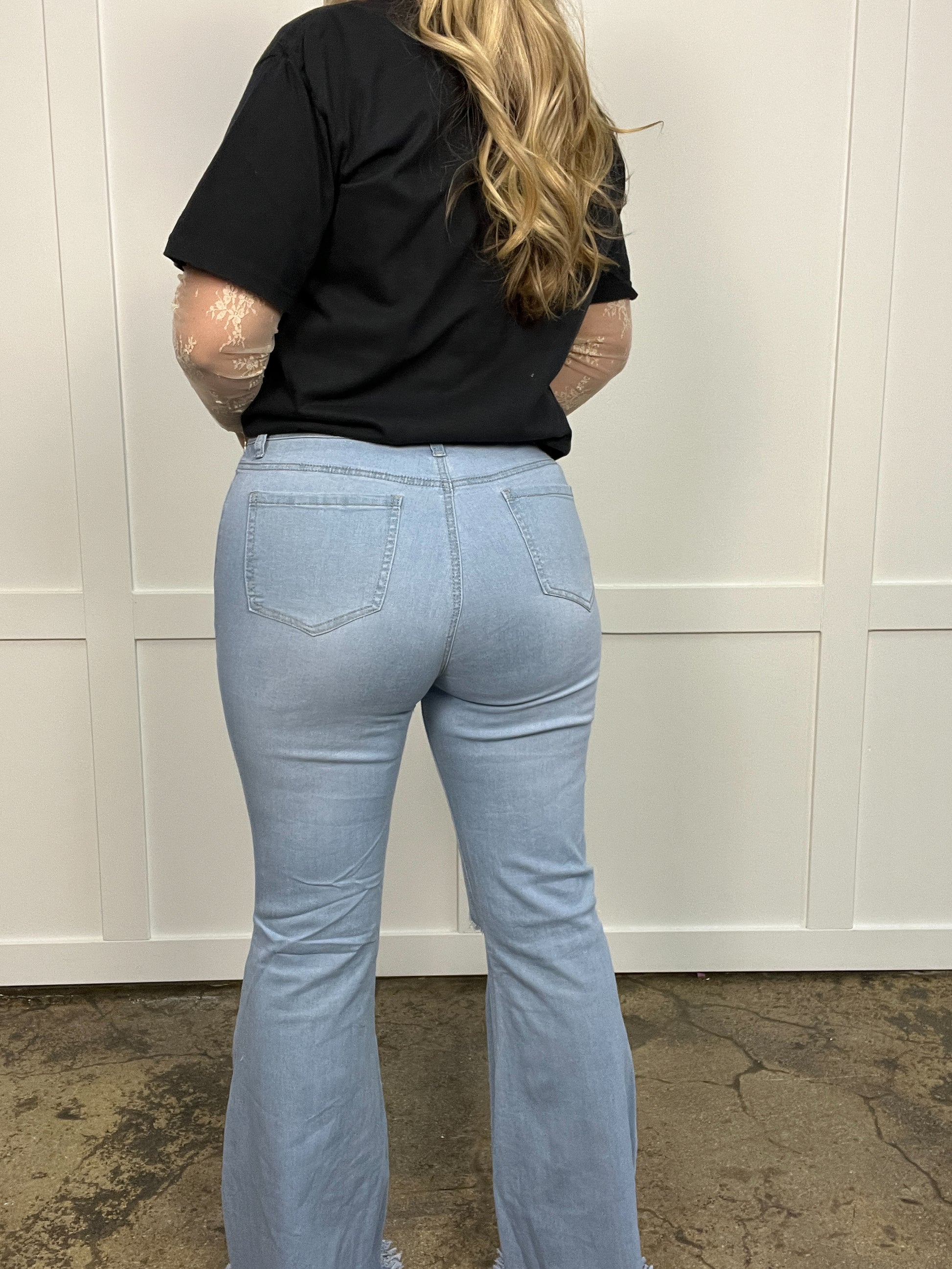 Buy our "Farrah Denim Distressed High Waisted Flares - Light Wash" online – Willow Boutique Clothing. Shop stylish Farrah Denim Distressed High Waisted Flares - Light Wash today.