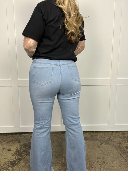 Buy our "Farrah Denim Distressed High Waisted Flares - Light Wash" online – Willow Boutique Clothing. Shop stylish Farrah Denim Distressed High Waisted Flares - Light Wash today.