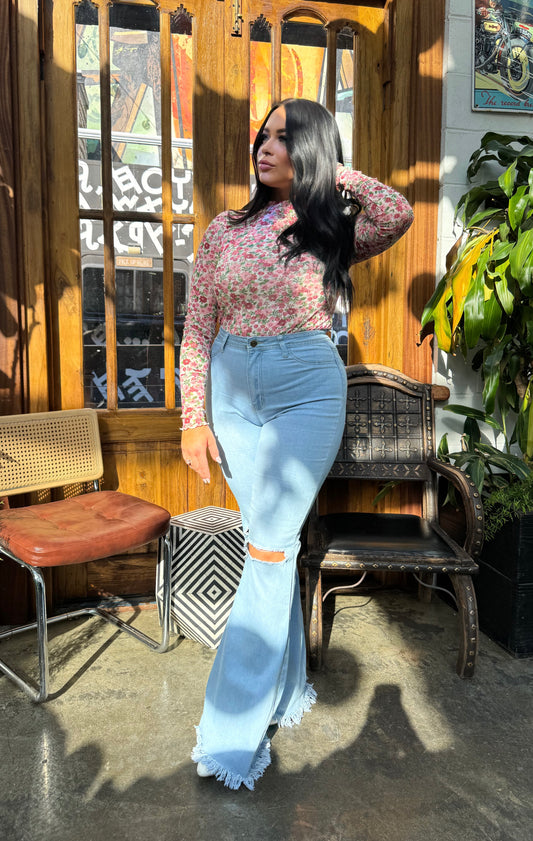 Buy our "Farrah Denim Distressed High Waisted Flares - Light Wash" online – Willow Boutique Clothing. Shop stylish Farrah Denim Distressed High Waisted Flares - Light Wash today.