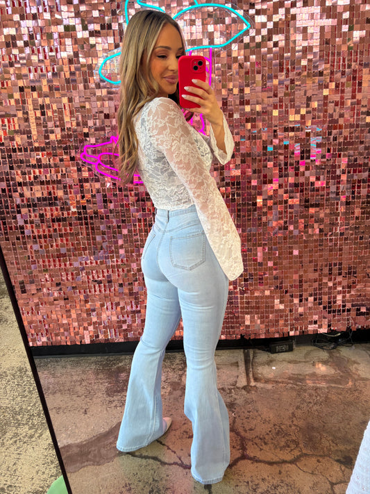 Buy our "Fiona High Waisted Bell Bottom Flare Jeans - Light Wash" online – Willow Boutique Clothing. Shop stylish Fiona High Waisted Bell Bottom Flare Jeans - Light Wash today.
