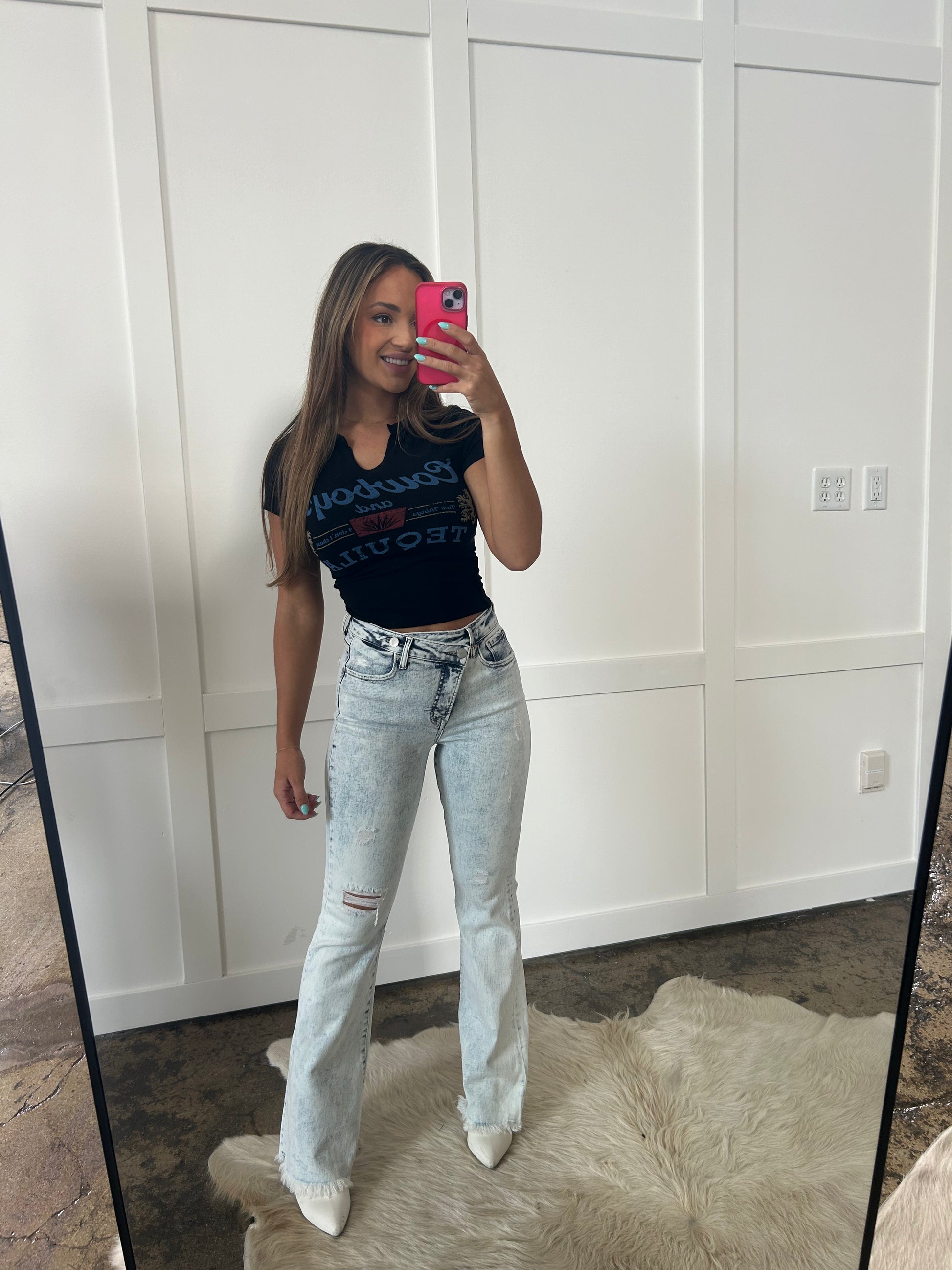 Buy our "PREORDER: Lucy Asymmetrical Control Distressed Flare Jeans" online – Willow Boutique Clothing. Shop stylish PREORDER: Lucy Asymmetrical Control Distressed Flare Jeans today.
