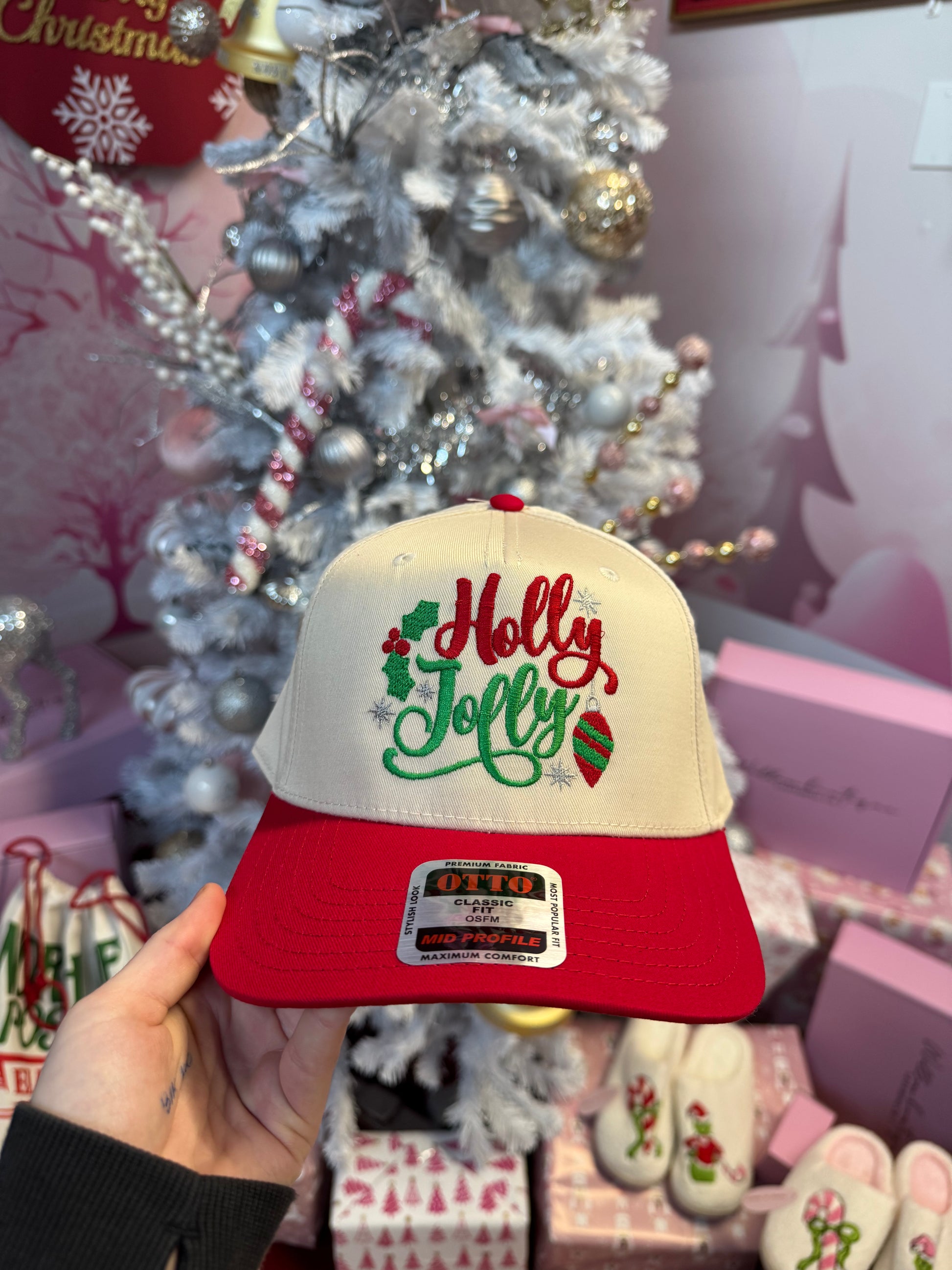 Shop Holly Jolly Embroidered Trucker Hat online at Willow Boutique – best boutique for women’s fashion.