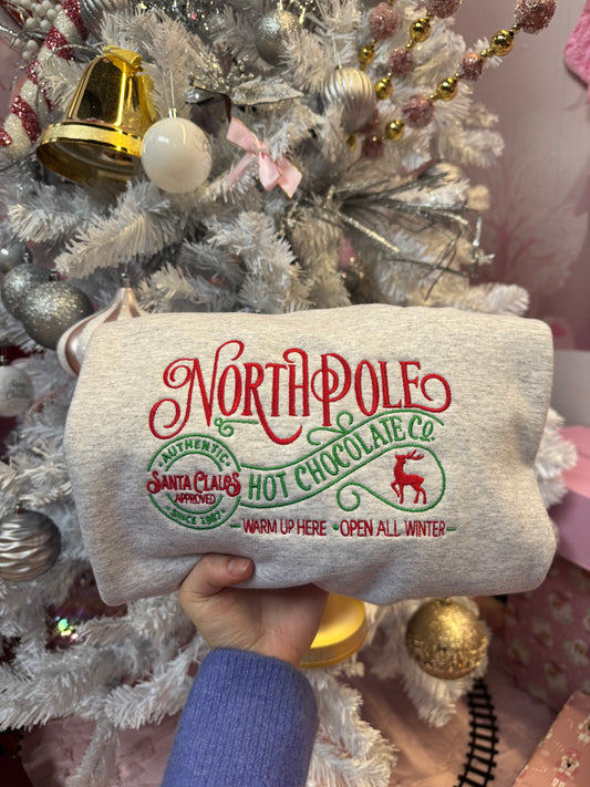 Shop Embroidered "North Pole Hot Chocolate" Holiday Crewneck online at Willow Boutique – best boutique for women’s fashion.