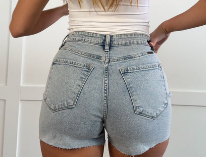 Mazie Asymmetrical Raw Hem Denim Shorts
