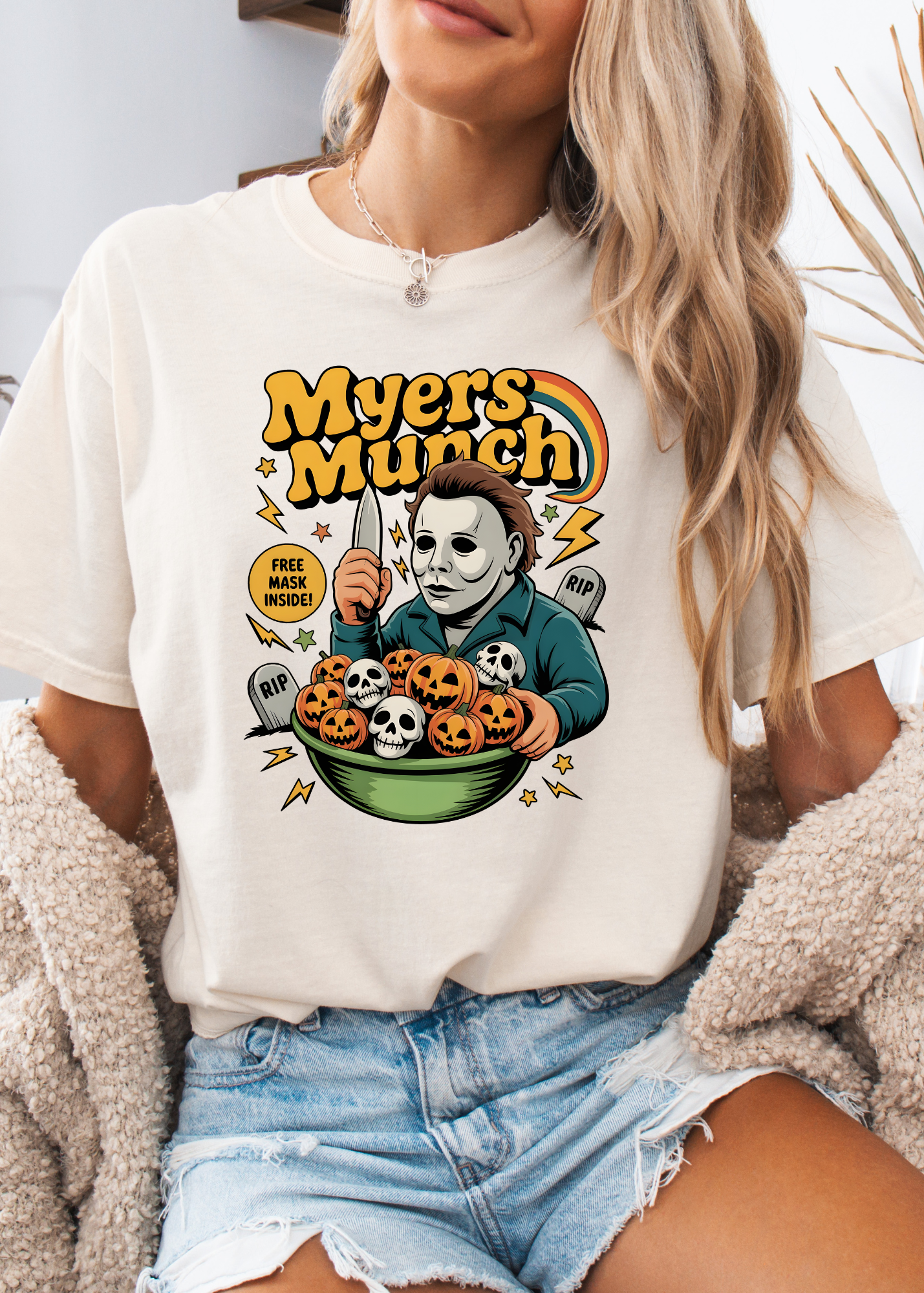 Person wearing a white t-shirt with 'Myers Munch' graphic design.