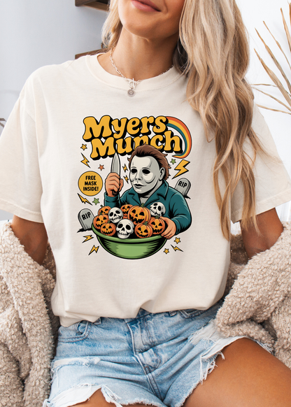 Person wearing a white t-shirt with 'Myers Munch' graphic design.