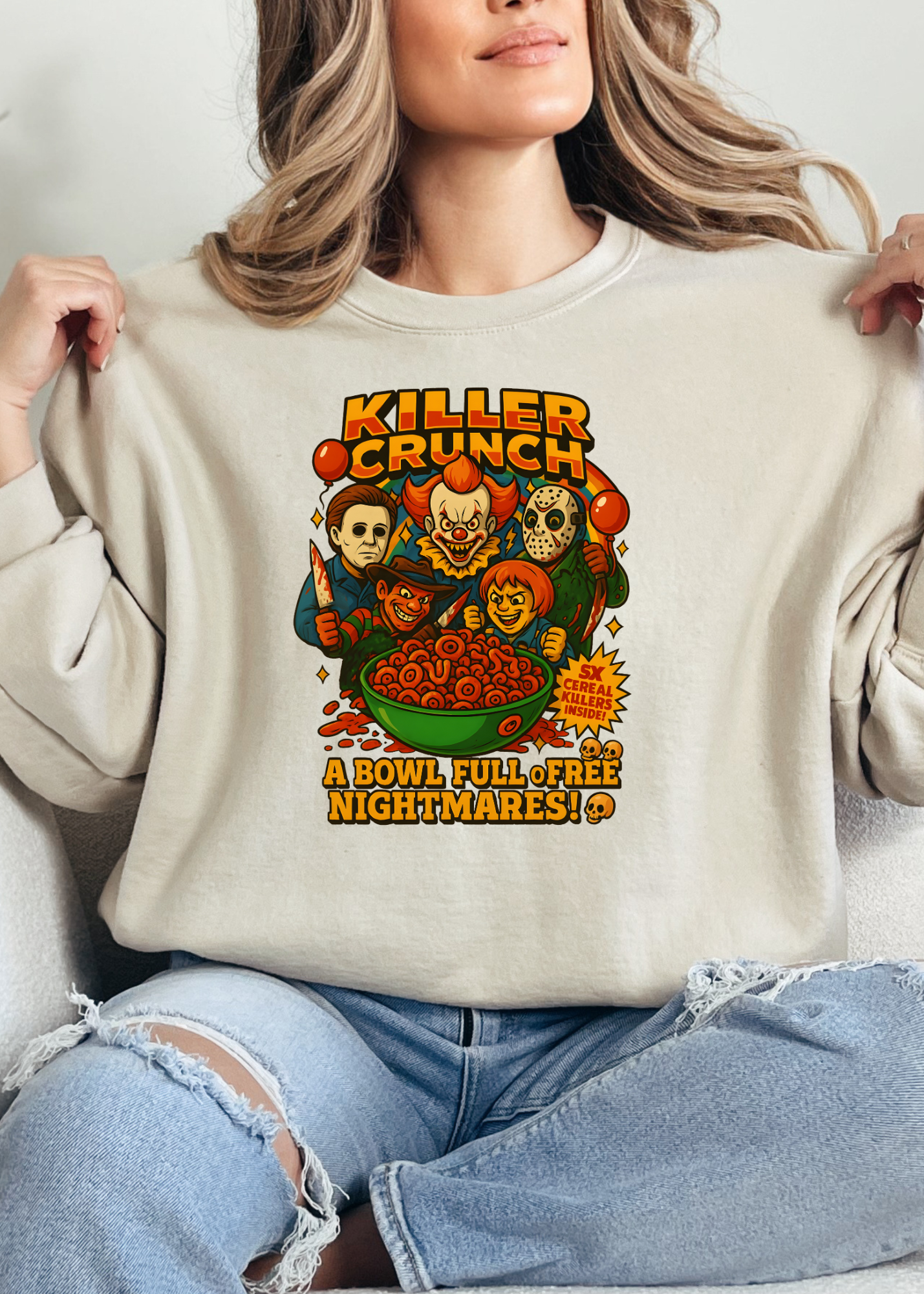 Person wearing a beige sweatshirt with a 'Killer Crunch' graphic design.