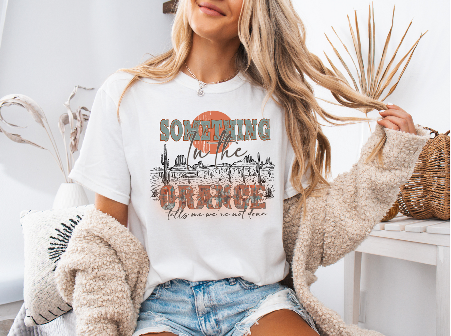 We're Not Done Graphic Tee