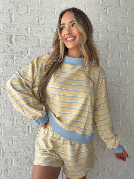 Angled view of the Marigold Morning striped lounge top