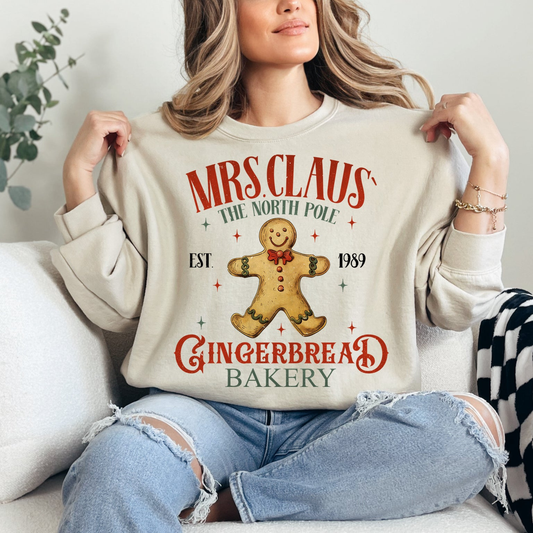 Mrs. Claus North Pole Cookie Bakery Graphic — Sand Crewneck