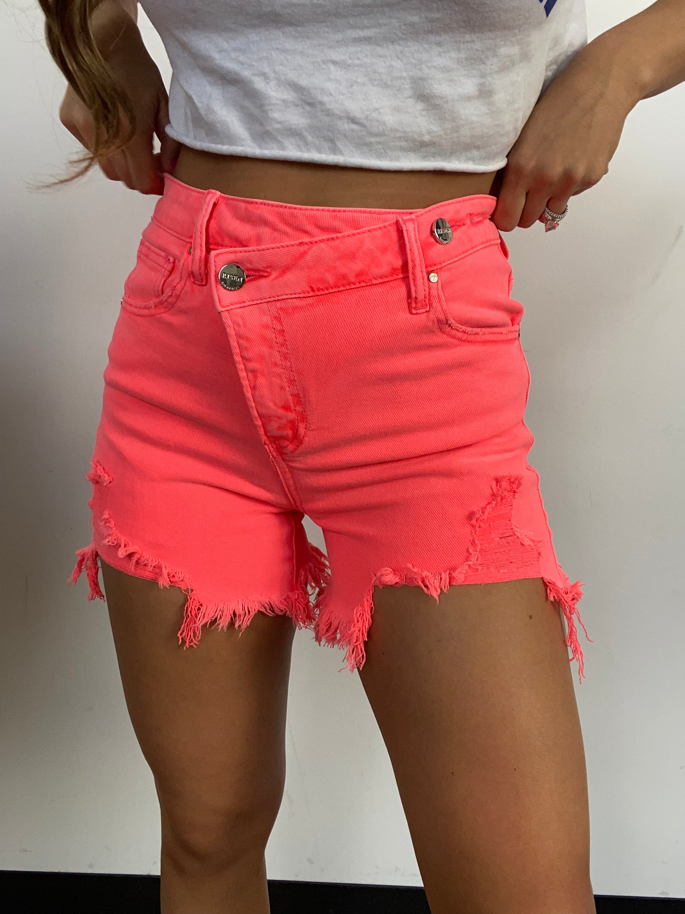 Lindsey Asymmetrical Distressed Shorts- Coral Pink